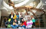 Graduate students in front of T-rex in Valley Life Sciences Building