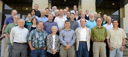 Group of IB Faculty on building steps